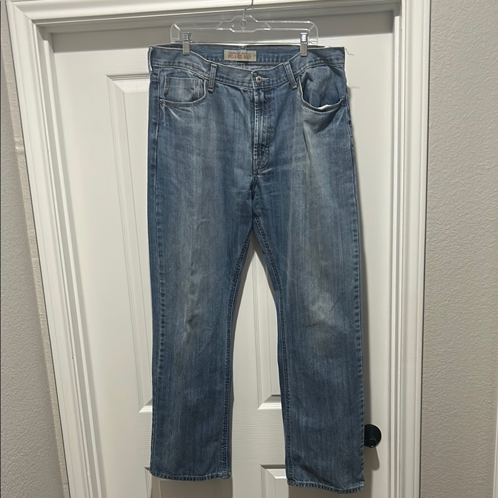 Wrangler Blue Relaxed Fit Jeans with Gold Stitching